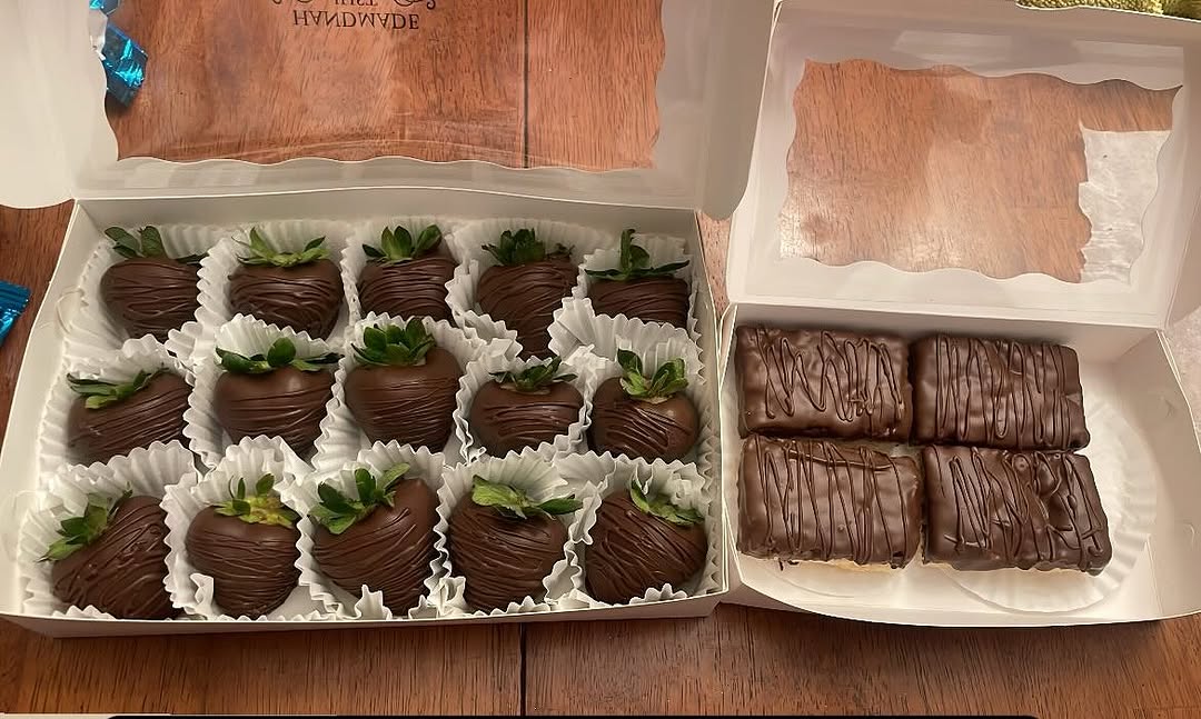 Two-box set of dark chocolate-covered strawberries and chocolate-dipped Rice Krispie bars with drizzle detailing.
